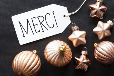Bronz Noel ağacı topları, Merci demektir teşekkür ederim