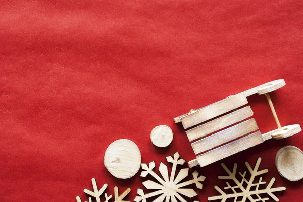 Décoration de Noël comme traîneau sur papier d'emballage, espace de copie — Photo