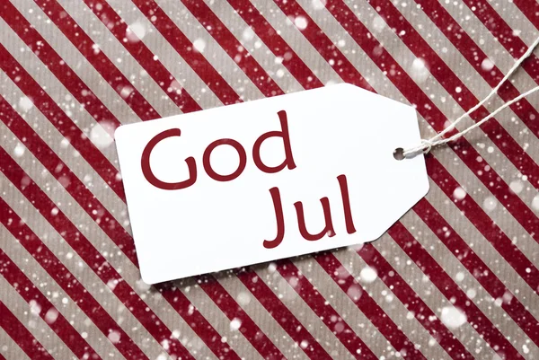 Ετικέτα σε κόκκινο χαρτί, χιονονιφάδες, Θεός Ιουλ σημαίνει καλά Χριστούγεννα — Φωτογραφία Αρχείου
