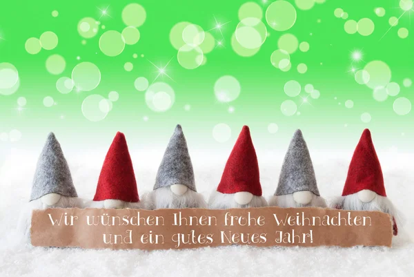 Гномы, зеленый фон, Bokeh, звезды, Neues Jahr означает Новый год — стоковое фото