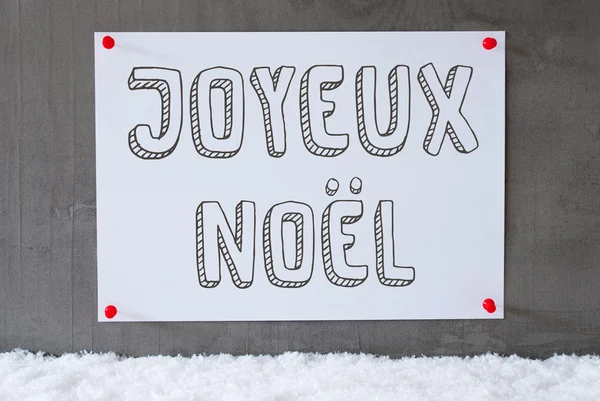 Etikett an Zementwand, Schnee, joyeux noel bedeutet frohe Weihnachten — Stockfoto