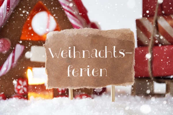 Gingerbread House With Sled, Snowflakes, Weihnachtsferien Means Christmas Break — Stock Photo, Image