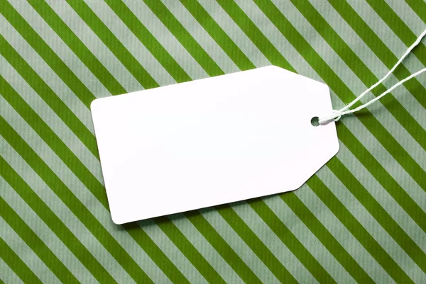 Label On Green Wrapping Paper And Copy Space — Stock Photo, Image