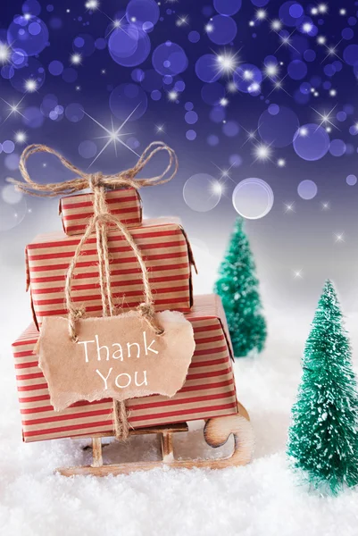 Vertikaler Weihnachtsschlitten auf blauem Hintergrund, Text Danke — Stockfoto