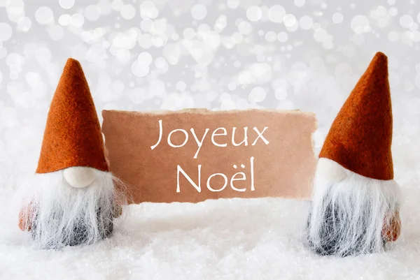 Bronzegnomen mit Karte, Text joyeux noel bedeutet frohe Weihnachten — Stockfoto