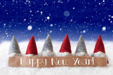 Cüceler, mavi arka plan, kar taneleri, metin mutlu yeni yıl