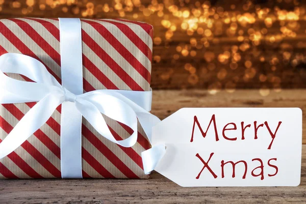 Atmosferyczne świąteczny prezent z etykietą, Merry Xmas — Zdjęcie stockowe