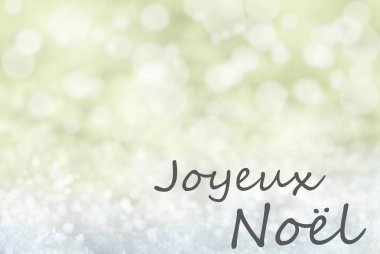 Altın Bokeh arka plan, kar, Joyeux Noel mutlu Noeller anlamına gelir.