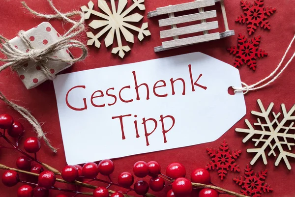 Étiquette avec décoration de Noël, Geschenk Tipp signifie pointe cadeau — Photo