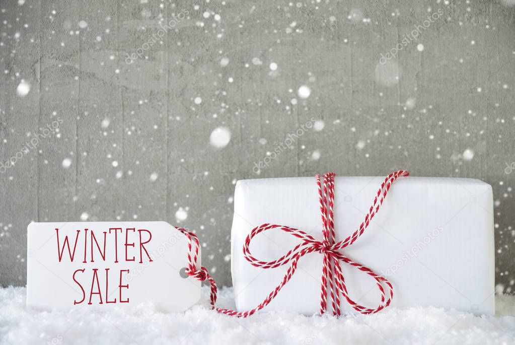 Gift, Cement Background With Snowflakes, Text Winter Sale