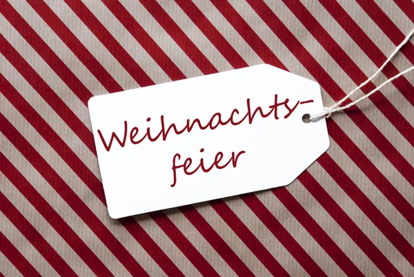 Label On Red Wrapping Paper, Weihnachtsfeier Means Christmas Party — Stock Photo, Image