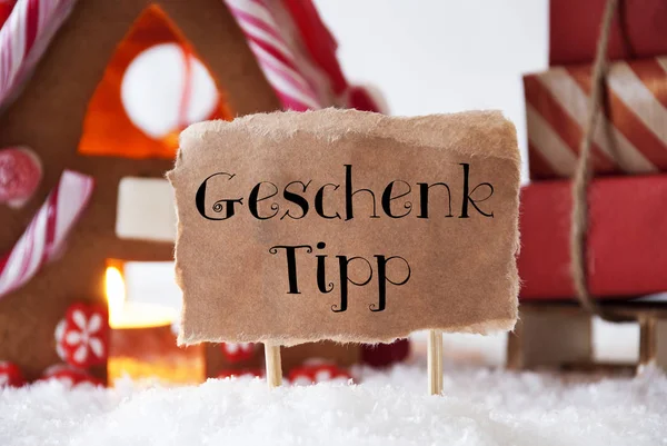 Maison en pain d'épice avec traîneau, Geschenk Tipp signifie pointe cadeau — Photo