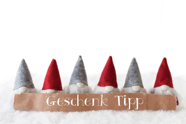 Tomtar, vit bakgrund, Geschenk Tipp innebär present tips — Stockfoto