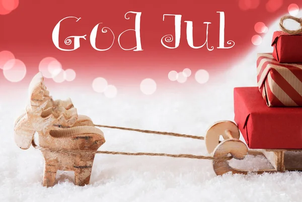 Renne avec traîneau, fond rouge, Dieu Jul signifie Joyeux Noël — Photo