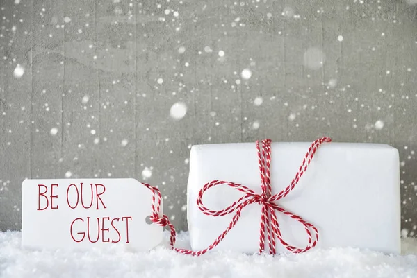 Gift, Cement Background With Snowflakes, Text Be Our Guest — Stock Photo, Image