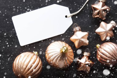 Bronz Noel topları, kar taneleri, metin mutlu tatiller