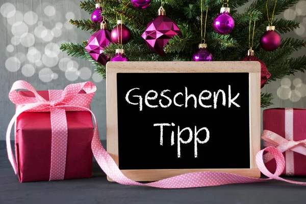 Boom met geschenken, Bokeh, tekst Geschenk Tipp middelen cadeau Tip — Stockfoto