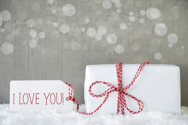 Gift, Cement Background With Bokeh, Text I Love You — Stock Photo, Image
