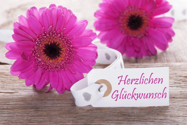 Pink Spring Gerbera, Label, Herzlichen Glueckwunsch Means Congratulations — Stockfoto