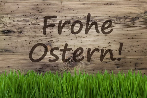 Latar Belakang Wooden yang menua, Gras, Frohe Ostern Berarti Selamat Paskah — Stok Foto