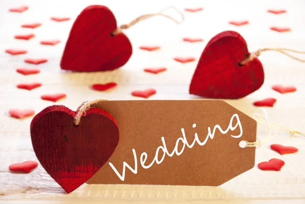 Etikett med många röda hjärta, Text bröllop — Stockfoto