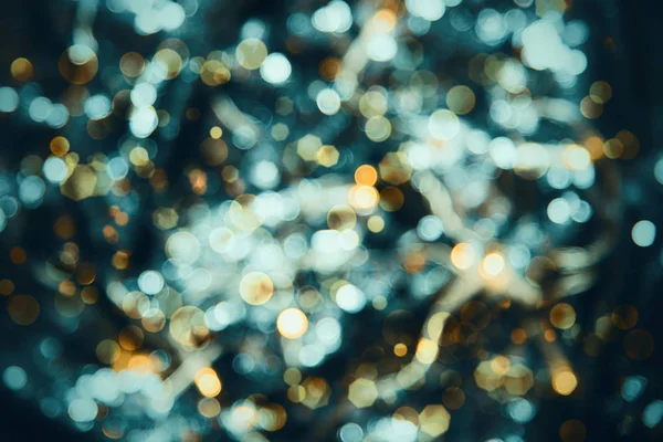 Світлі бірюзові вогні Фон, вечірка, святкування або різдвяна текстура — стокове фото