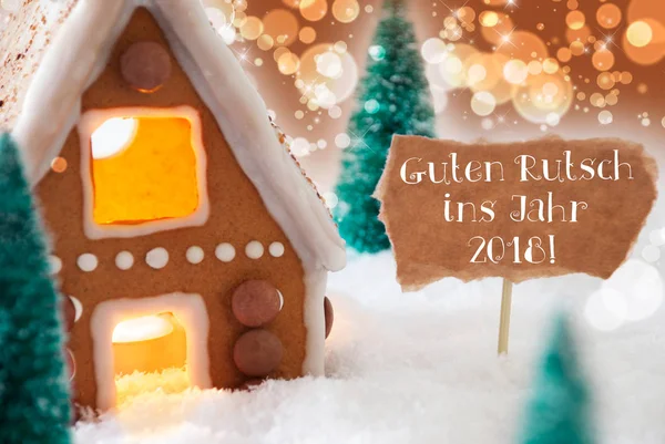 Пряничный домик, бронзовый фон, Guten Rutsch 2018 - Новый год — стоковое фото