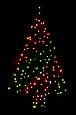 Kırmızı ve yeşil parlak parlayan sihirli Noel ağacı