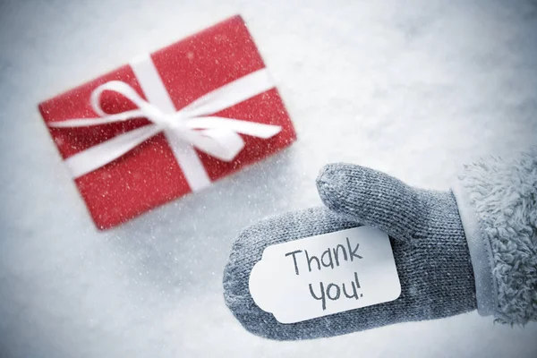 Piros ajándék, kesztyű, szöveg Köszönöm, hópelyhek — Stock Fotó
