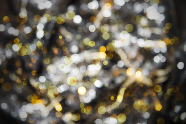 Світлі золоті вогні фон, вечірка, святкування або різдвяна текстура — стокове фото