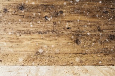 Rustik ahşap dokulu arka plan kopya alanı ile kar taneleri, ve