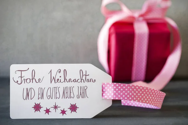 Roze Gift, kalligrafie, Frohe Weihnachten betekent vrolijk kerstfeest — Stockfoto