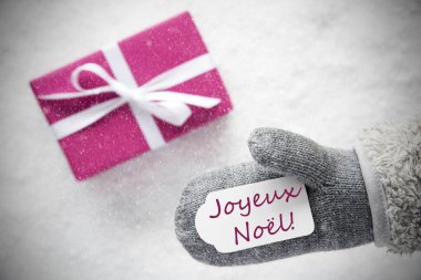 Pembe hediye, eldiven, Joyeux Noel mutlu Noeller, kar taneleri anlamına gelir.