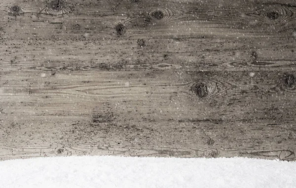 Šedá dřevěná textura, pozadí s Copy prostoru, sněhové vločky — Stock fotografie