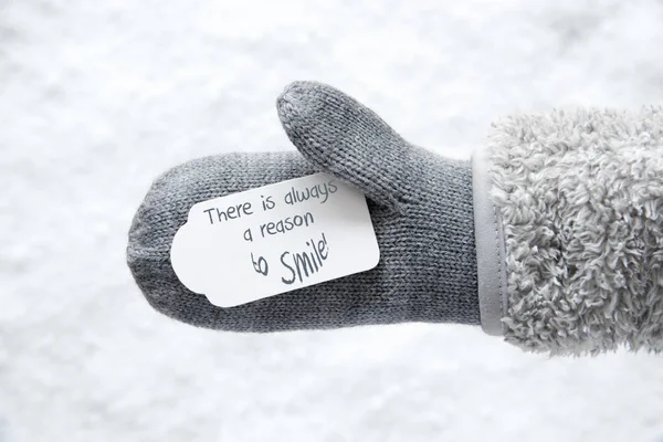 Gant en laine, Étiquette, Neige, Citation Toujours Raison de Sourire — Photo