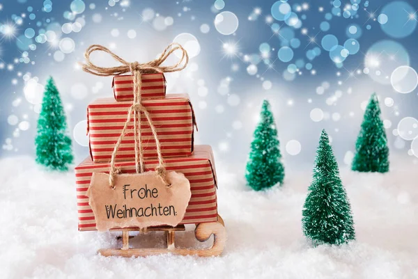 Sled, Present, Snow, Frohe Weihnachten Means Merry Christmas, Blue Background — Stock fotografie