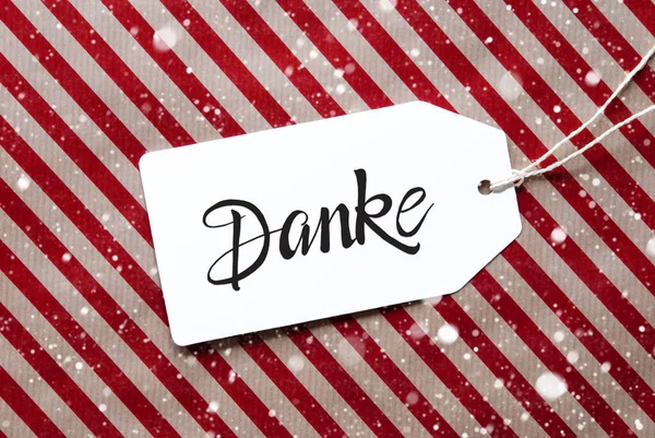 Red Wrapping Paper, Label, Danke Means Thank You, Snowflakes — стоковое фото