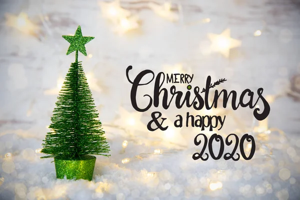 Albero di Natale verde, Luci, Stella, Neve, Buon Natale e Felice 2020 — Foto Stock