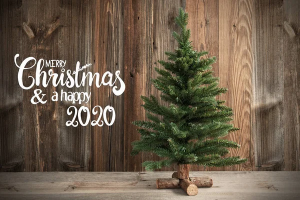 크리스마스 트리, 캘리 그래피 메리 크리스마스와 행복 한 2020 년, 나무 배경 — 스톡 사진