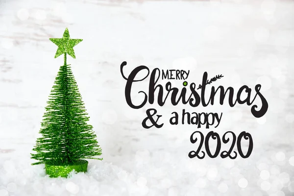 Albero di Natale verde, Stella, Neve, Buon Natale e Felice 2020 — Foto Stock