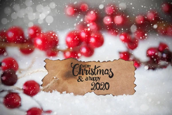 Červená dekorace, sníh, etiketa, Veselé Vánoce a šťastný rok 2020, vločky — Stock fotografie