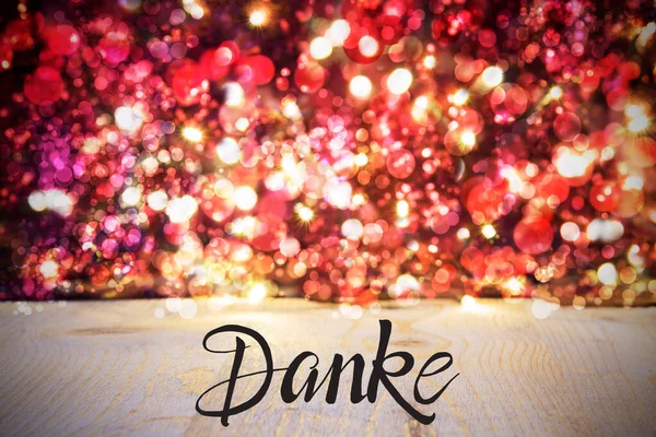 Fondo de Navidad, Luces centelleantes rojas, Danke significa gracias — Foto de Stock