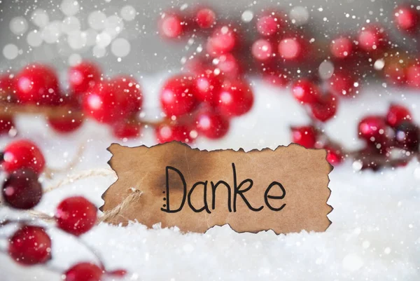 Красное украшение, снег, ярлык, Данке означает Спасибо, Снежинки — стоковое фото
