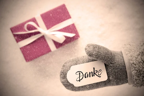Gray Glove, Pink Gift, Label, Snowflakes, Danke Means Thank You — Stock Photo, Image