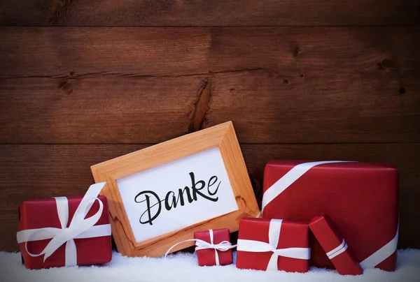 Quadro, Presente vermelho, neve, Danke significa obrigado — Fotografia de Stock