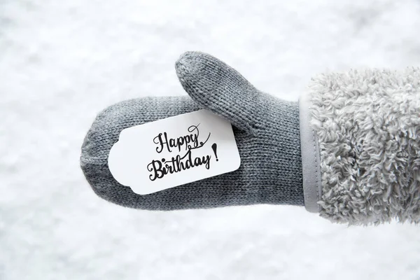 Guanto grigio, etichetta, neve, calligrafia Buon compleanno — Foto Stock