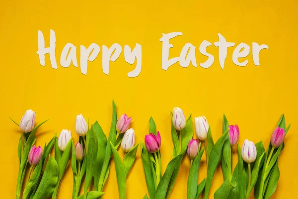 Colorful Tulip, Spring Flowers, Text Happy Easter, Yellow Background — Stockfoto