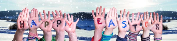 Children Hands Building Word Happy Easter, Winter Scenery — Stockfoto