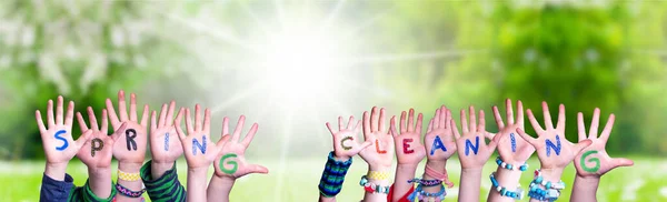 Children Hands Building Word Spring Cleaning, Grass Meadow — Stok fotoğraf