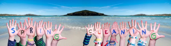 Children Hands Building Word Spring Cleaning, Ocean Background — ストック写真